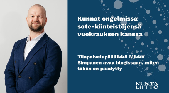 Mies ja sininen tausta.